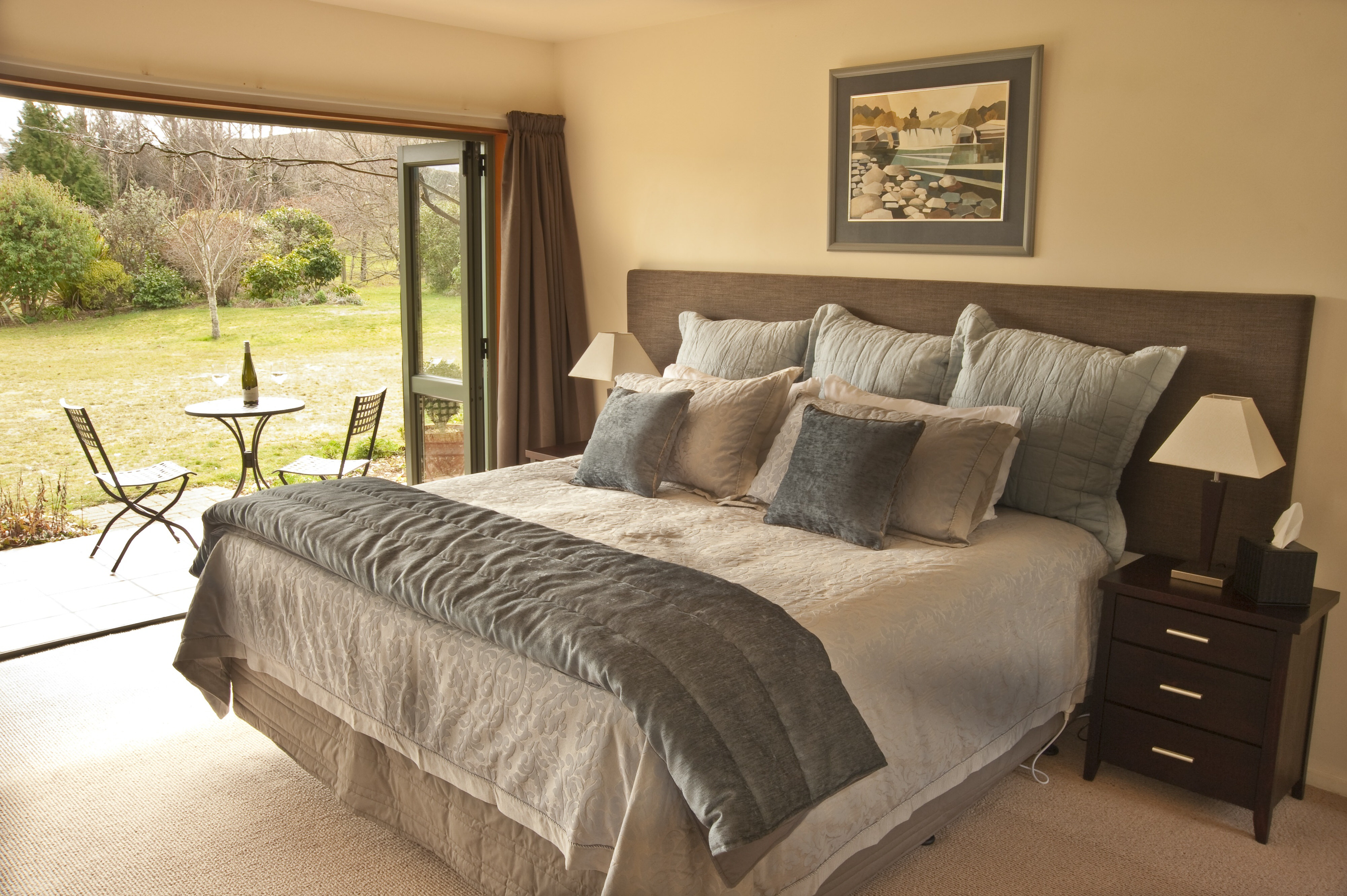 NZ solo accommodation: A bedroom looking out into nature